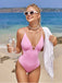 Maillot de bain rose à bretelles texturées unies des années 1950