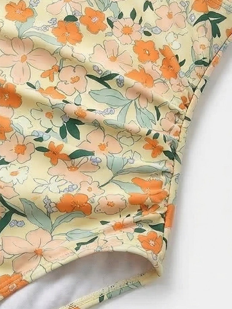 Maillot de bain une pièce fronces et col V fleuri années 1980