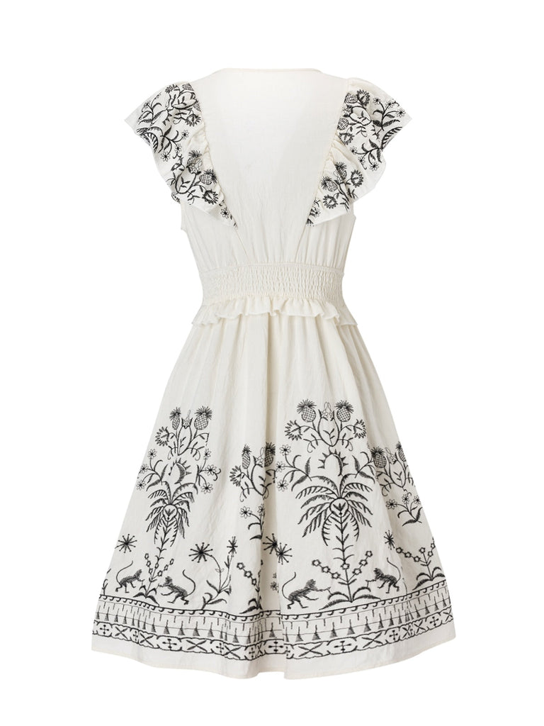 Robe col V à volants floraux blanc des années 1970