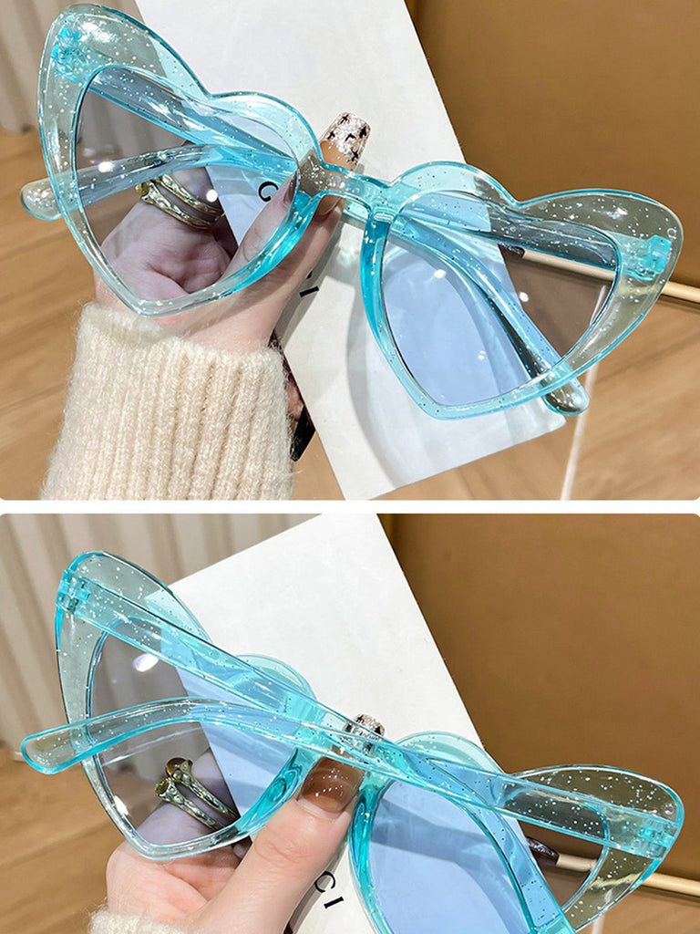 Lunettes de soleil à monture en forme de cœur incurvée
