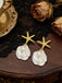 Boucles d'oreilles pendantes en coquillage d'étoile de mer doré perle