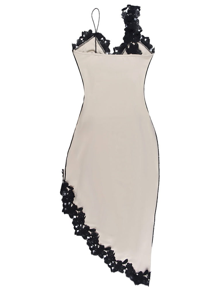 Robe moulante asymétrique en dentelle col V profond années 1960