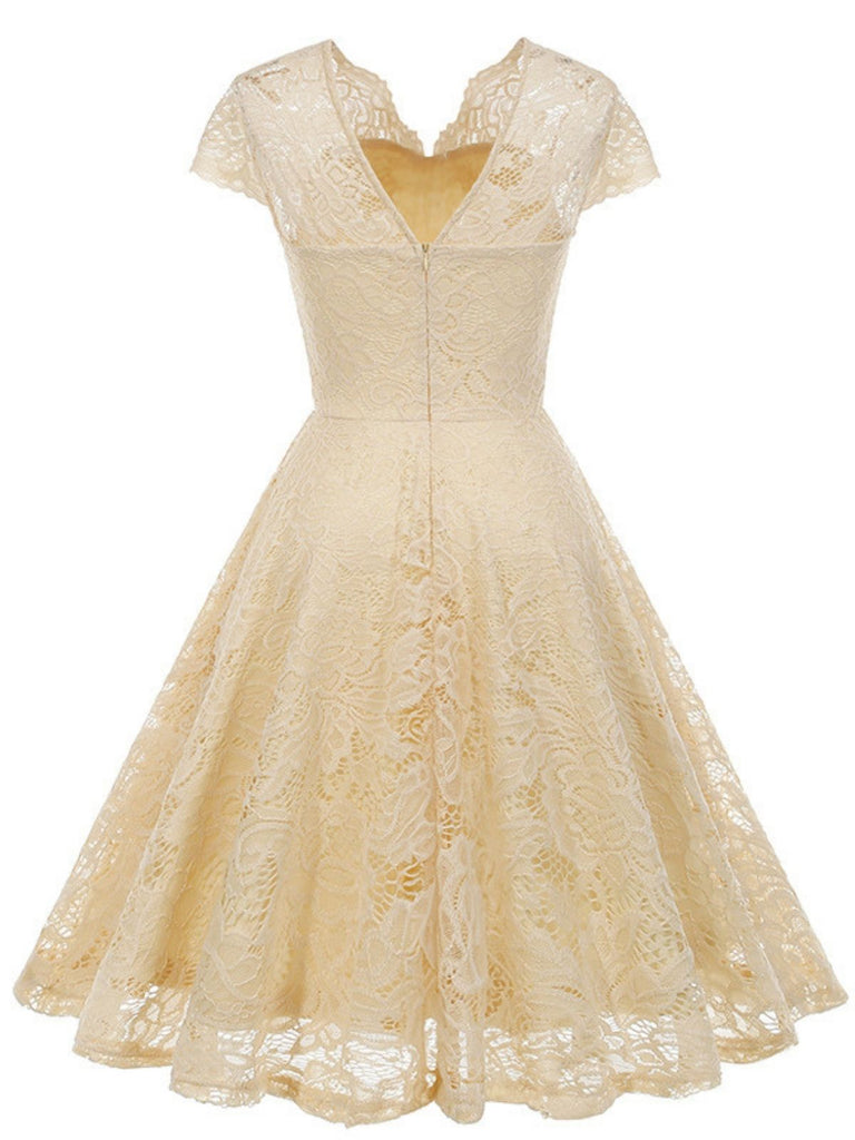 Robe en dentelle unie à col en V et sans manches années 1950