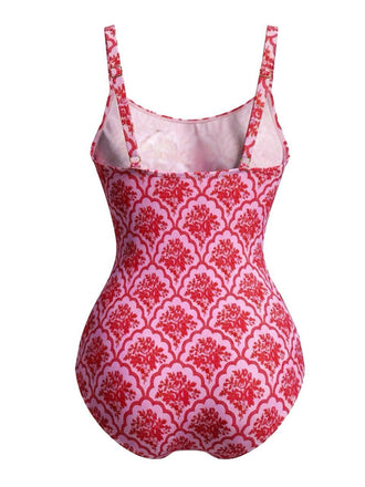 Red and white patterned swimsuit on a white background