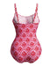 Red and white patterned swimsuit on a white background