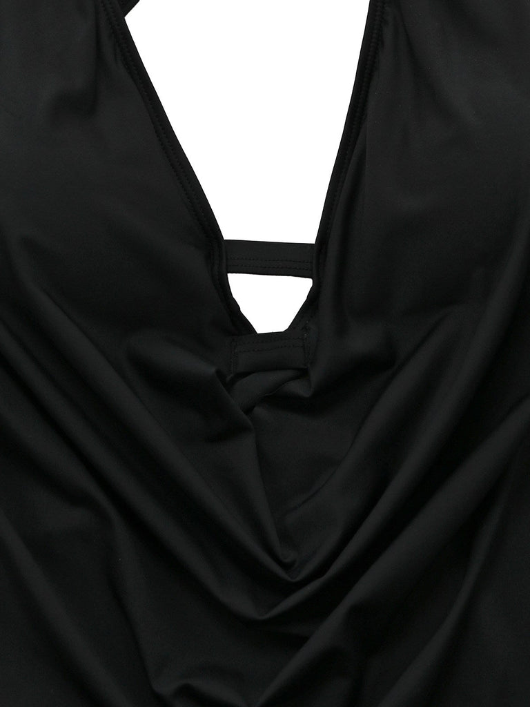 Black vintage tankini with crisscross cutout details and lace-up design in 1940s style
