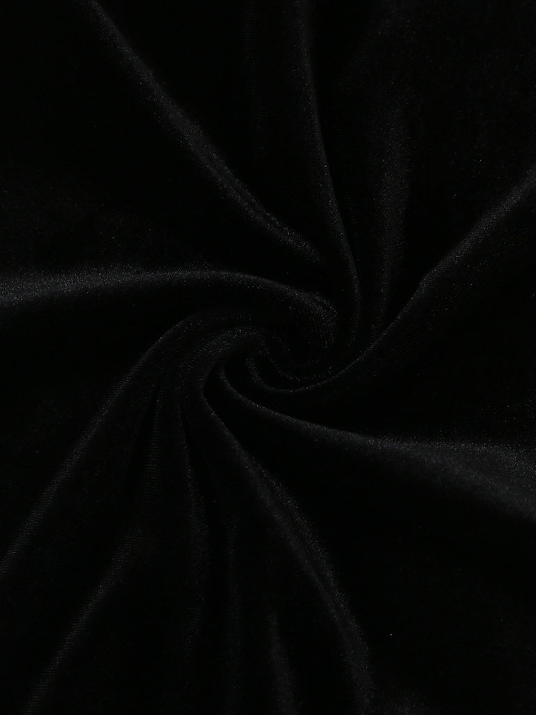 Close-up of black fabric with a swirling pattern