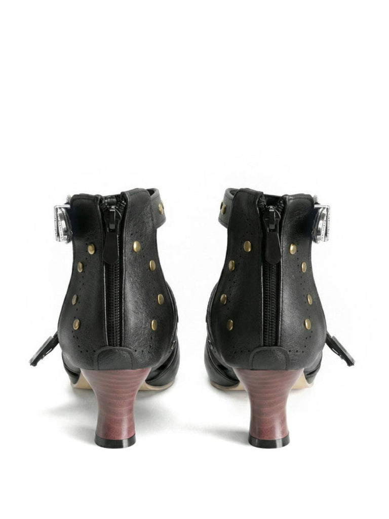 Edgy pointed toe faux leather sandals featuring vintage studded details, ideal for modern professional looks and trendy street style outfits