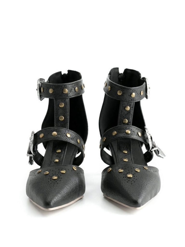 Pair of black studded high-heeled shoes on a white background