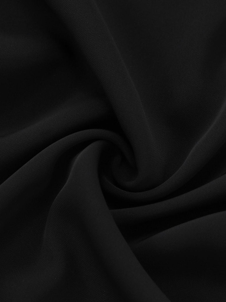 Close-up of black fabric with folds