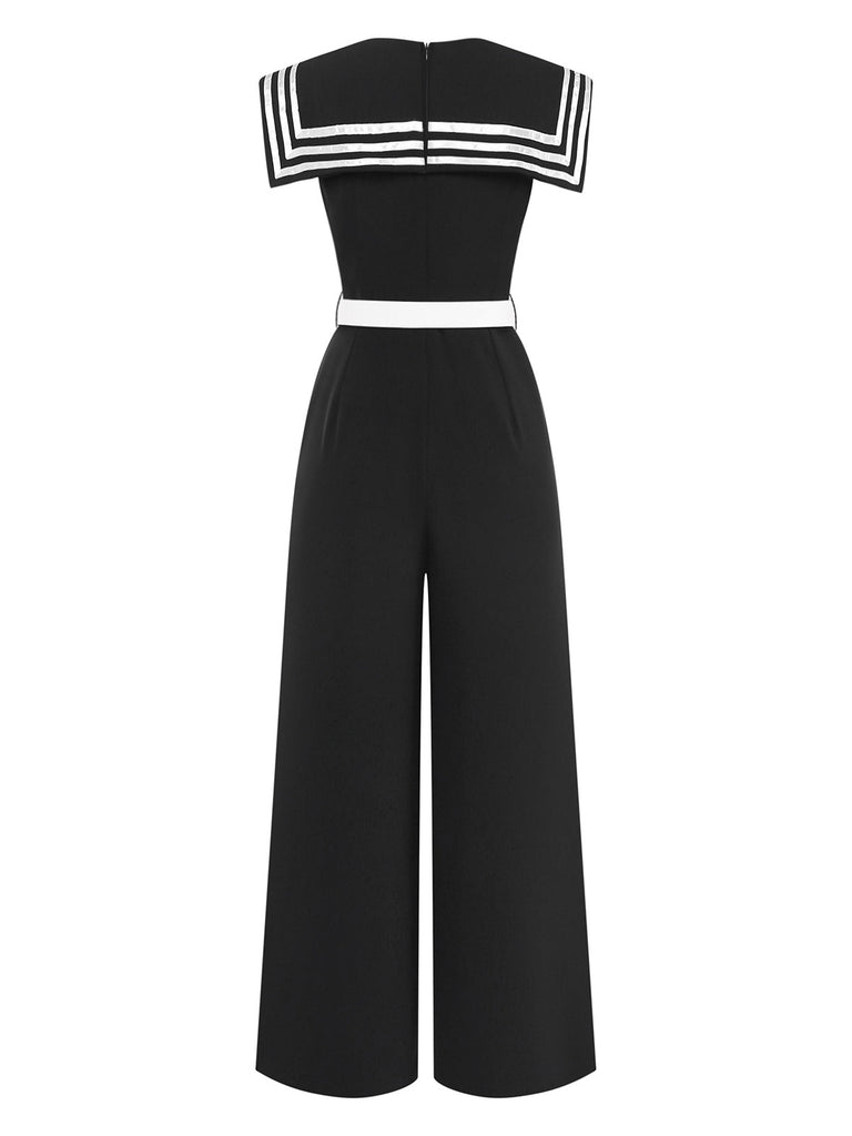 Black jumpsuit with white accents on a white background