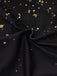 Black fabric with gold and silver star patterns