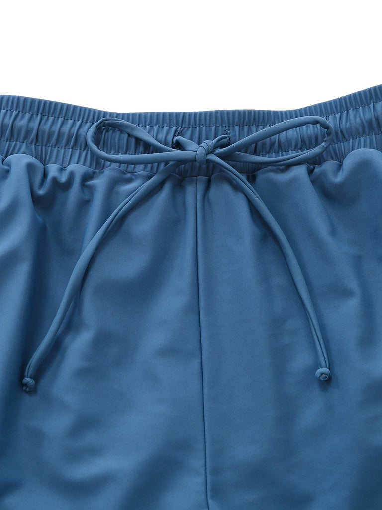 Maillot de bain rayé bleu poches et fronces années 1940