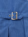 Close-up of a blue denim jacket with a silver buckle.