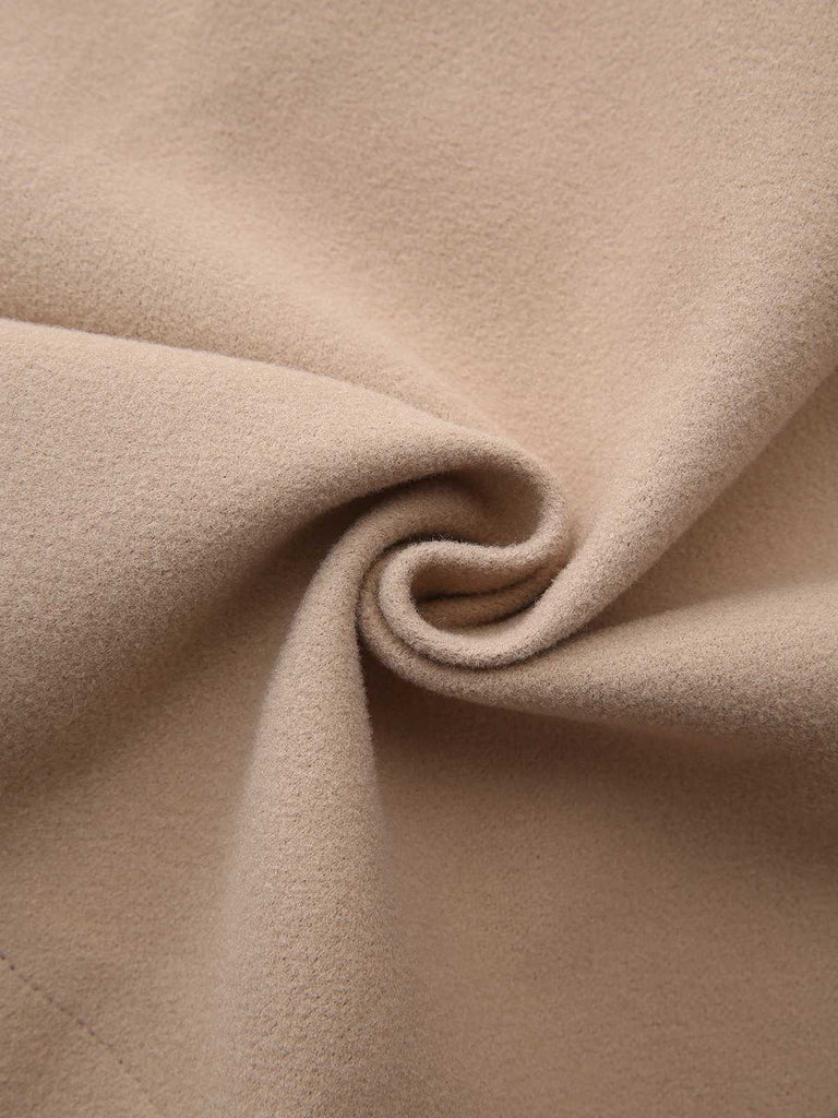 Manteau tailleur uni revers années 1940