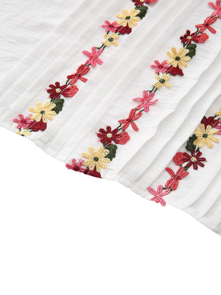 Chemisier blanc col volanté brodé de fleurs style années 1930