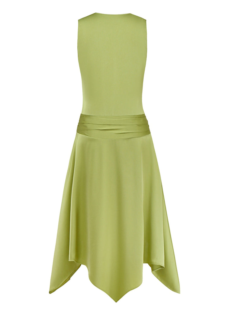 Green dress with a fitted bodice and flared skirt on a white background