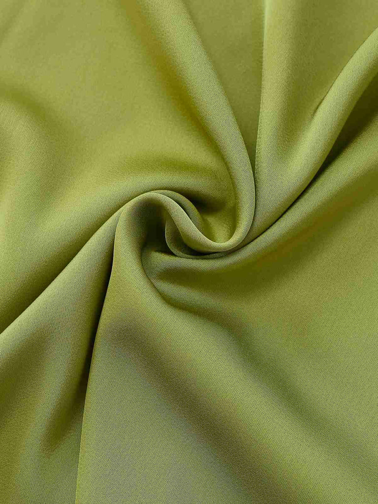 Close-up of green fabric with folds