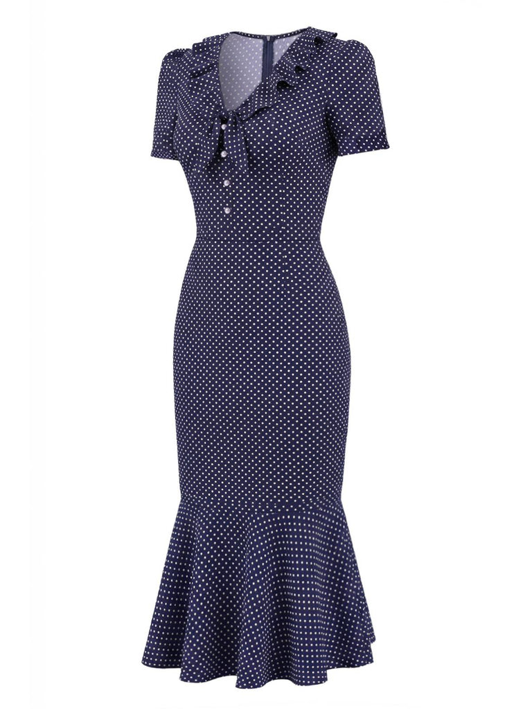 Navy polka dot dress with Ruffled-Collar details on a white background