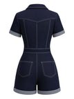 Navy blue romper with gray trim on a white background