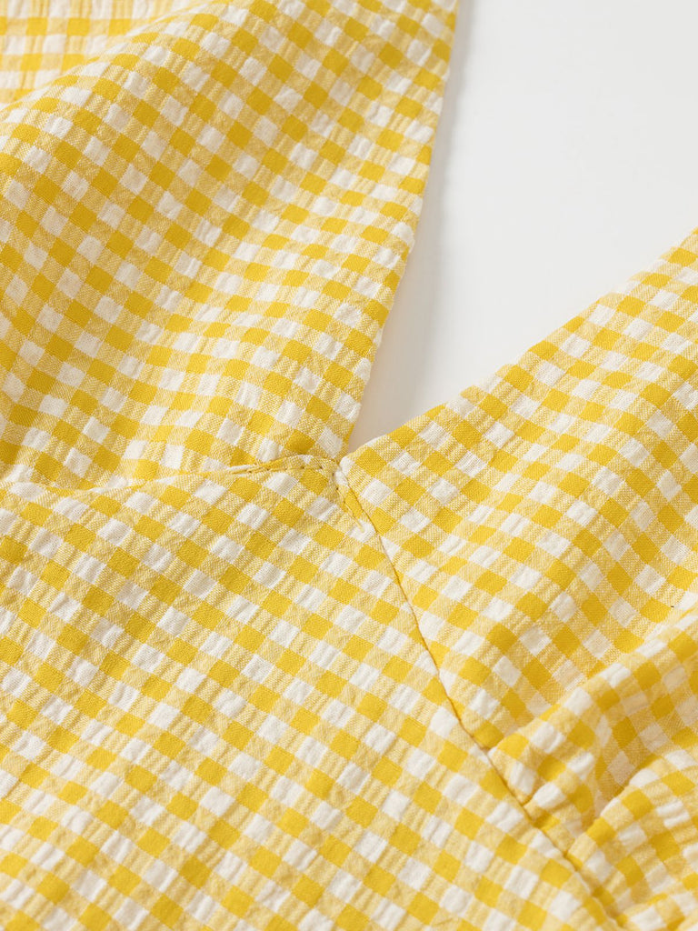 Robe à carreaux jaunes col v dos nu des années 1960