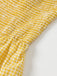 Robe à carreaux jaunes col v dos nu des années 1960