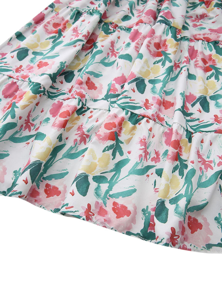 Floral patterned fabric with pink, yellow, and green colors on a white background