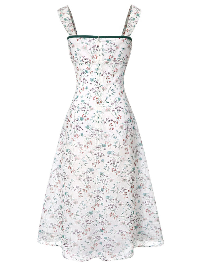 Floral dress with thin straps on a white background