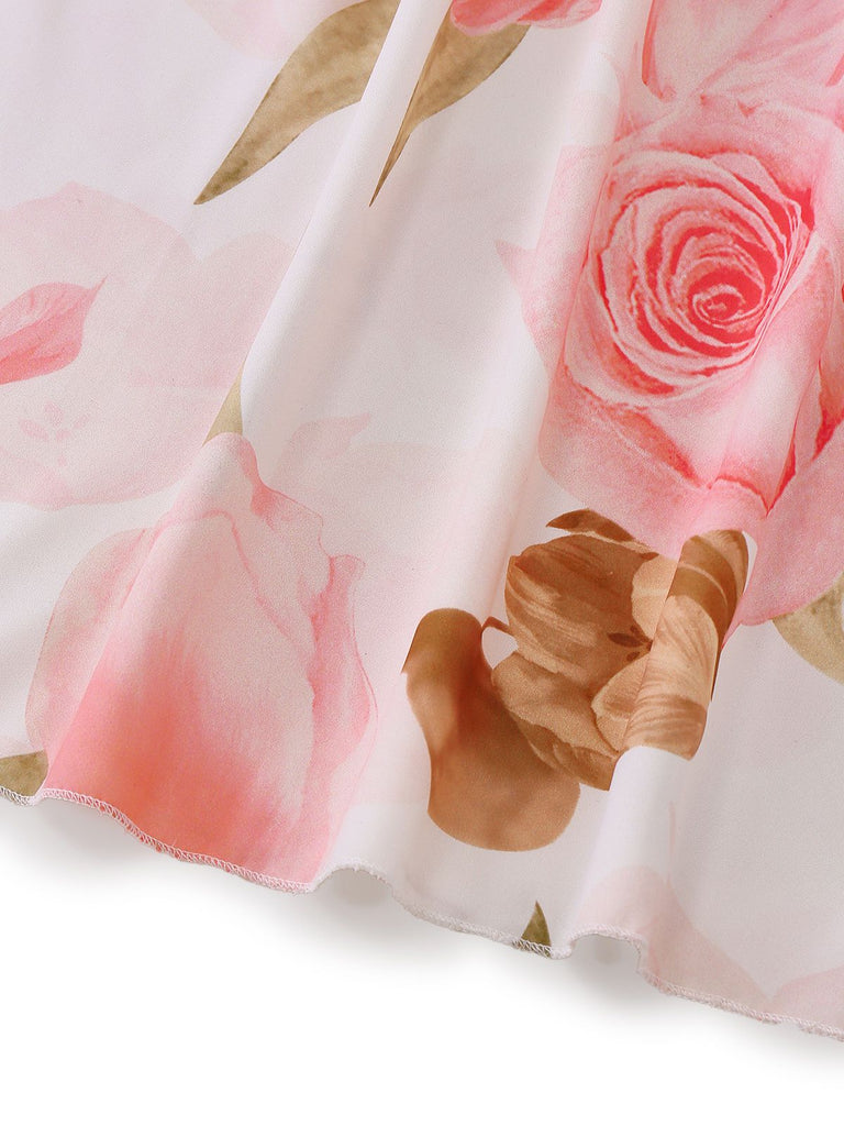 Robe longue rose à imprimé floral col en V et manches bouffantes années 1950