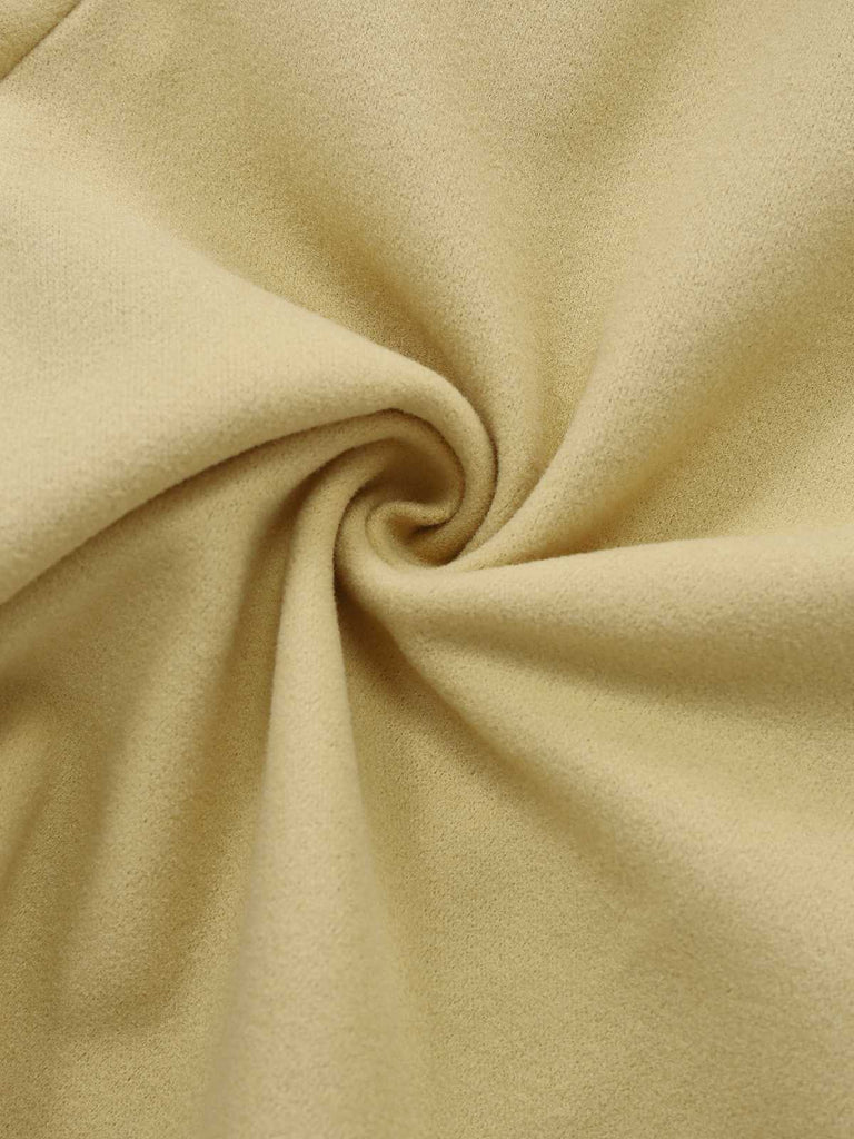 Manteau croisé à revers jaune des années 1930