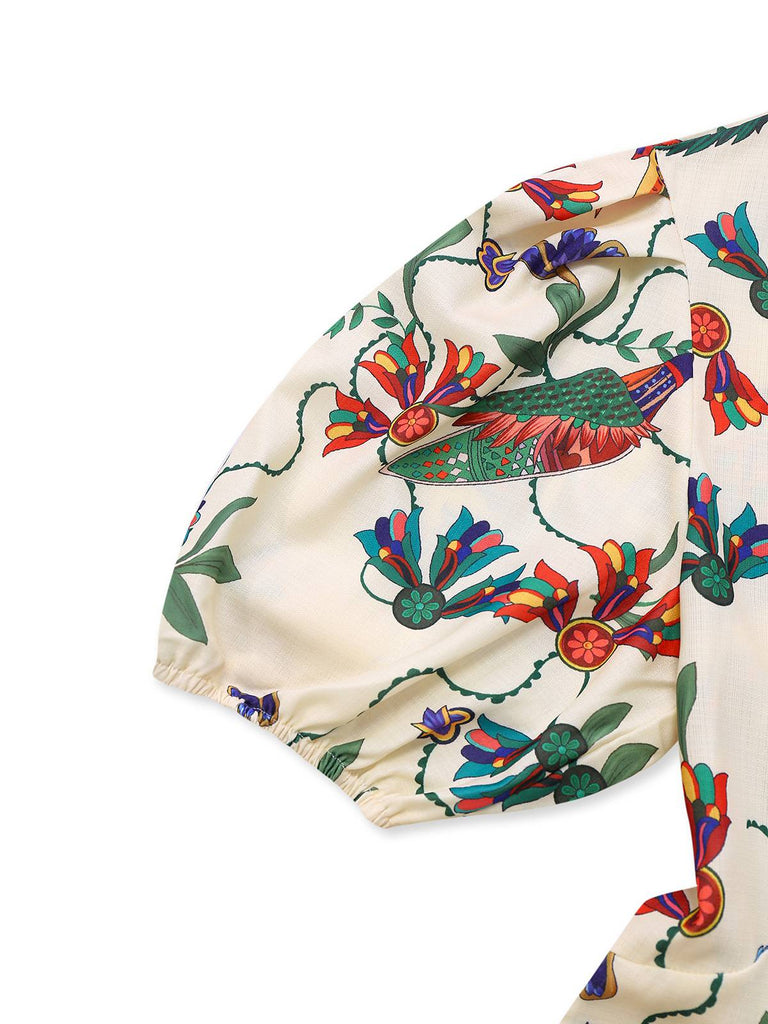 Robe beige fleurs et oiseaux à manches bouffantes années 1940