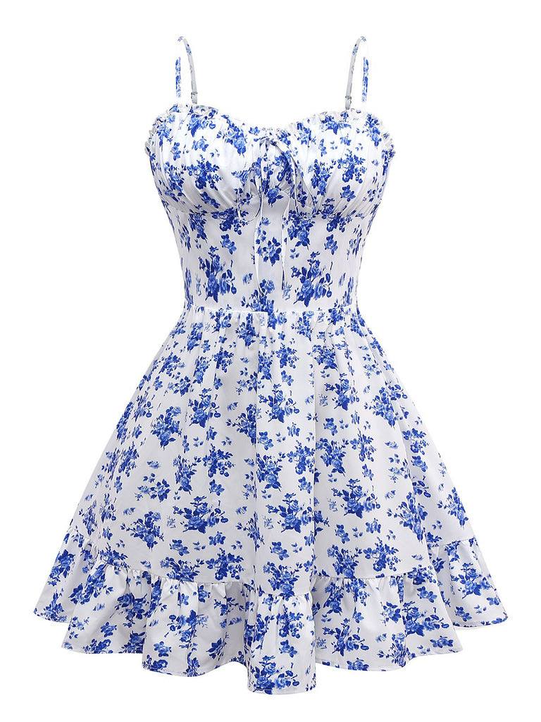 Robe bleue à bretelles fines et fleurs des années 1950