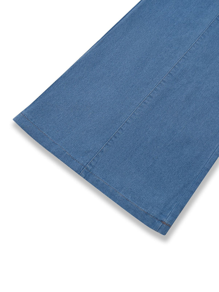 Combinaison bleue en denim à manches bouffantes années 1970