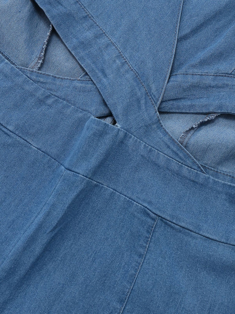 Combinaison bleue en denim à manches bouffantes années 1970