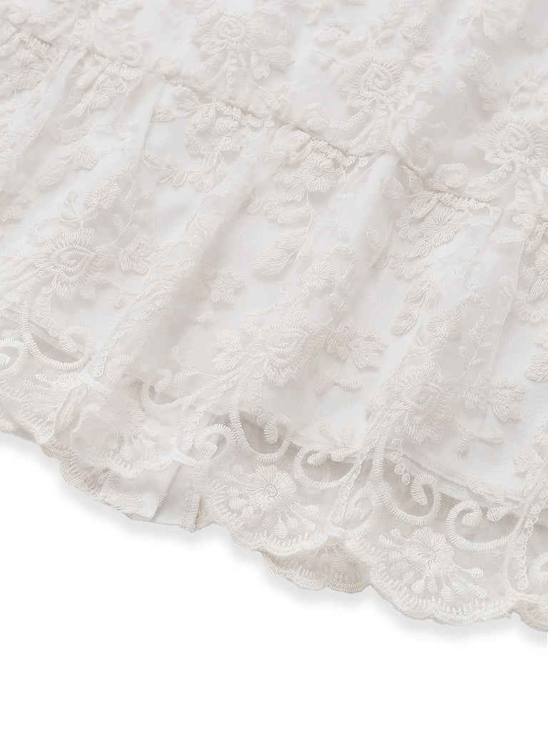 Robe blanche en dentelle de pur coton uni années 1960