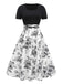 Robe noire fleurie à col carré des années 1950