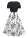 Robe noire fleurie à col carré des années 1950