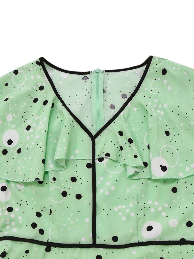 Robe à pois irréguliers à volants et col en V années 1940