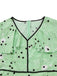 Robe à pois irréguliers à volants et col en V années 1940