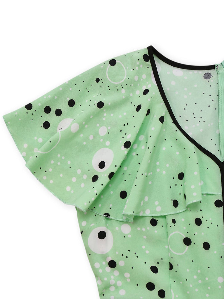 Robe à pois irréguliers à volants et col en V années 1940