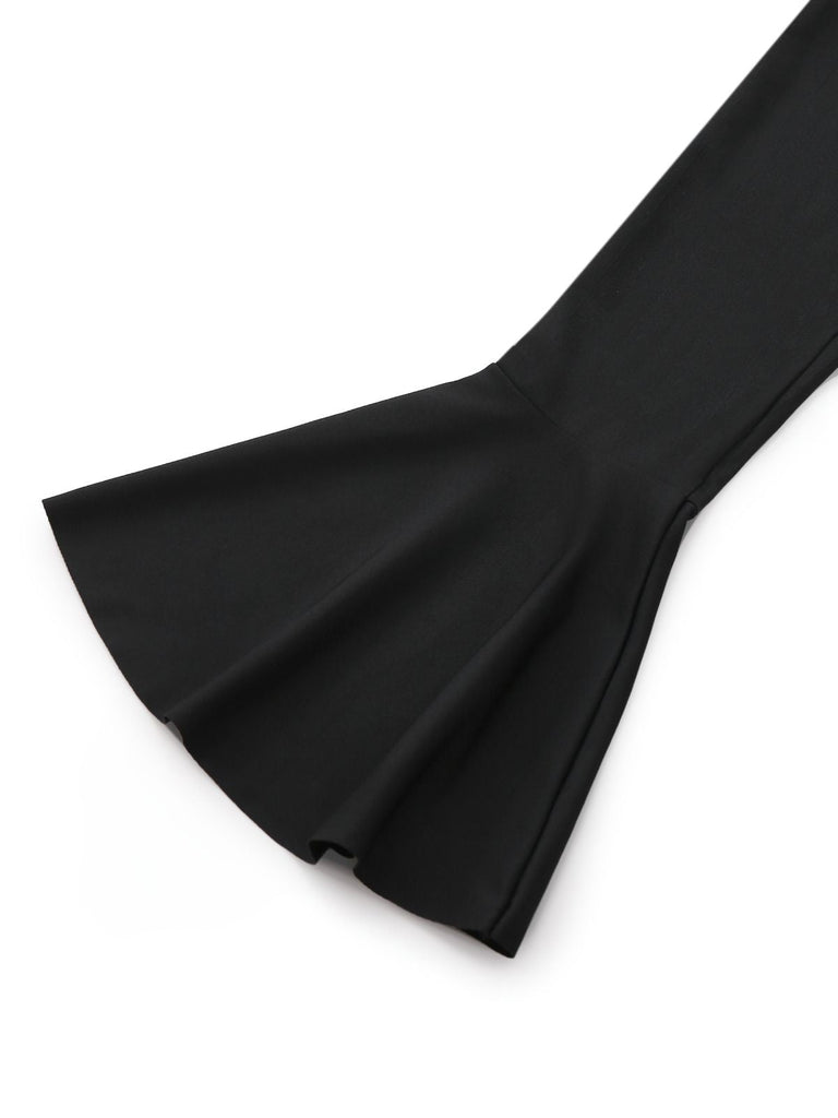 Robe péplum à volants noire et blanche années 1960