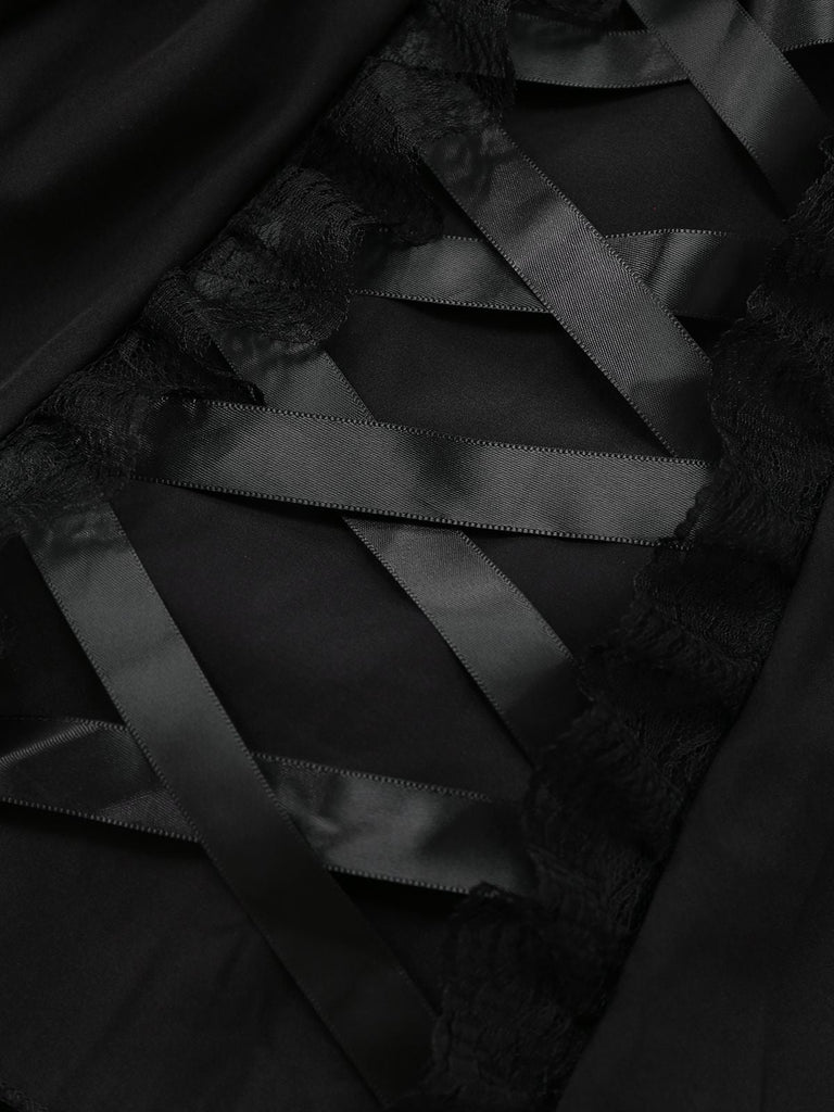 Robe noire à lacets style gothique des années 1950