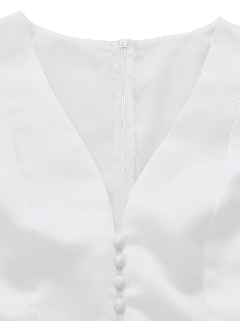 Robe blanche unie sans manches col en V boutons années 1950