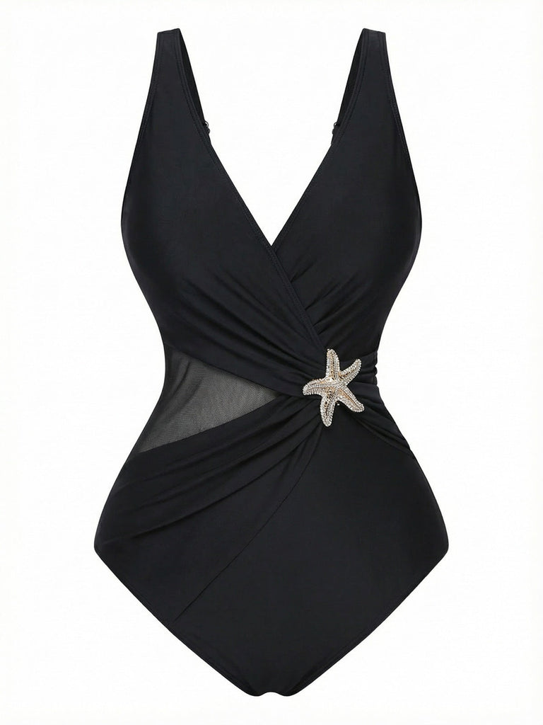 Maillot de bain rétro années 50 à imprimé étoiles de mer, avec décolleté en V et technologie gainante, idéal pour un look plage et piscine assuré.