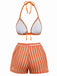 Orange and white bikini set on a white background