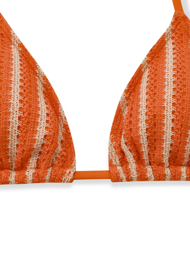 Orange and white striped bikini top on a white background