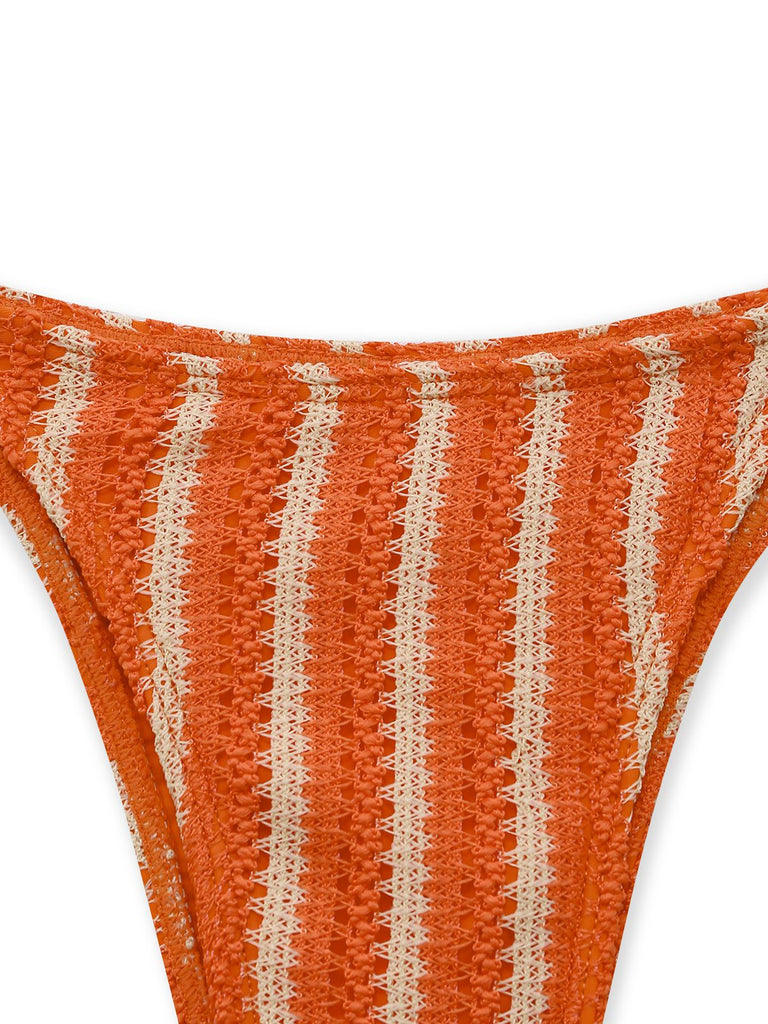 Orange and white striped bikini bottom on a white background