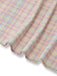 Pastel plaid swing dress with ruffled bow details and sweetheart neckline for 1950s vintage styling