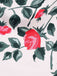 Floral pattern with pink and red roses on a light background