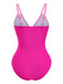 Pink swimsuit with thin straps on a white background